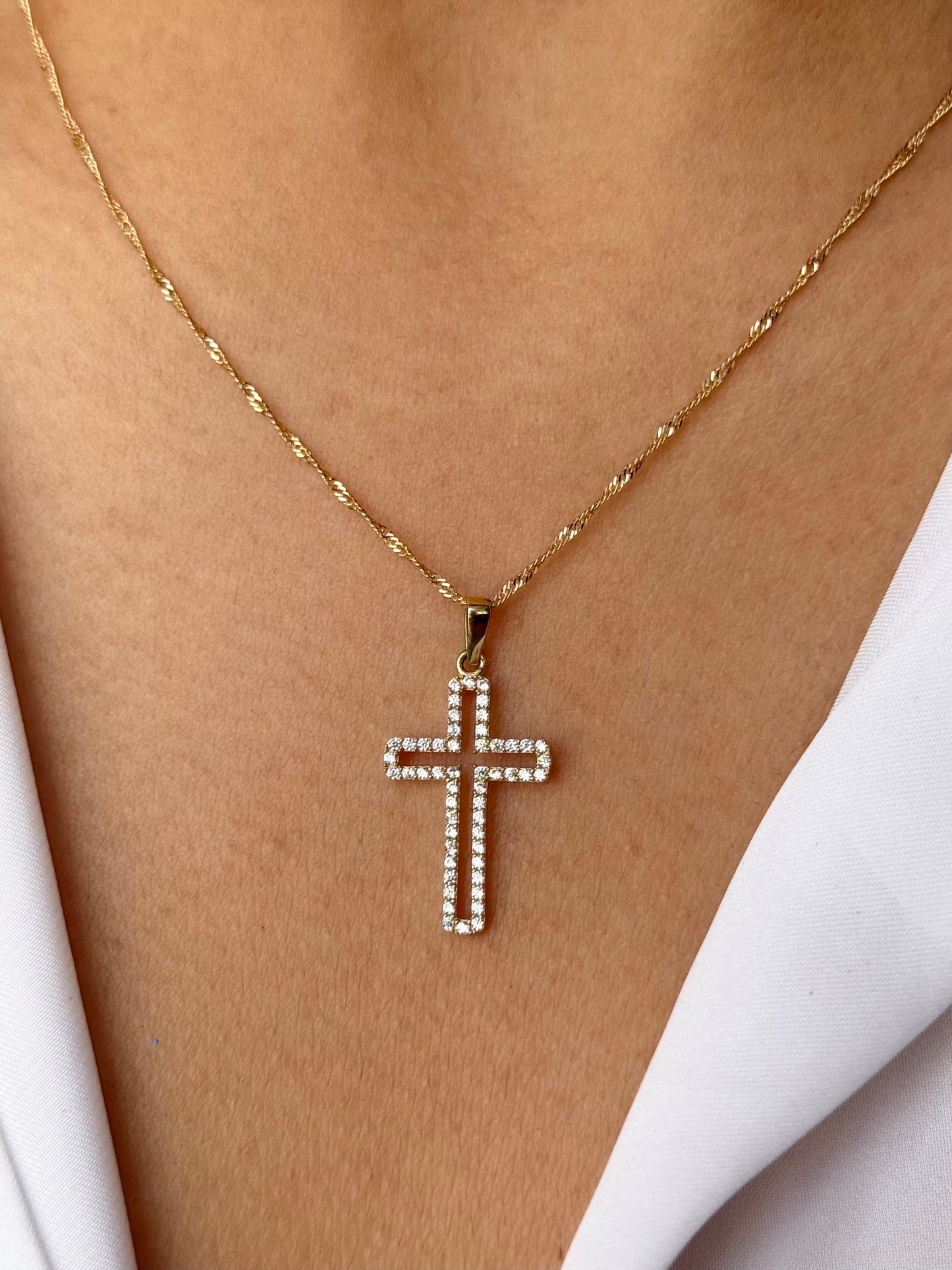 Cruz zirconia silueta